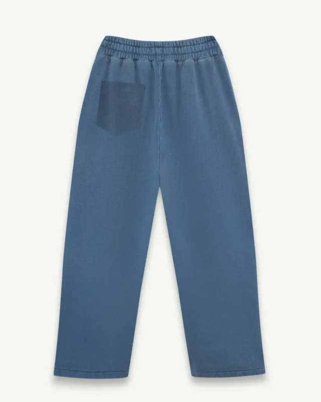 Illicit Bloc Sweatpants styled with hoodie and sneakers